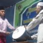 Sunari Kades Kuala Kahar, Kecamatan Seberang Kota, Kabupaten Tanjung Jabung Barat, Jambi saat membuka secara resmi perhelatan MTQ ke VIII Tingkat Desa, Jum'at (3/6/22) Malam. FOTO : Putra
