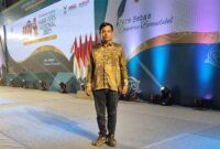 Ketua SMSI Jambi Mukhtadi Putranusa Terima Penghargaan 'Press Card Number One' di Puncak Hari Pers Nasional Medan. FOTO : Ist