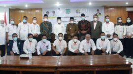FOTO : Bupati H. Anwar Sadat saat membuka acara Musyawarah Kabupaten (Muskab) ke-V Kamar Dagang dan Industri (Kadin) Kab. Tanjab Barat di Pola Utama Kantor Bupati, Sabtu (10/04/21).