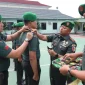 Dandim 0419/Tanjab Letkol Arm Dwi Sutaryo, S.E., M.Han saat Pimpin Upacara Korps Raport Kenaikan Pangkat. FOTO : PENDIM
