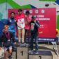 Berdiri di Podium Juara 1 (Satu) M Ihsan Atlet FPTI Tanjung Jabung Barat Peraih Medali Emas. FOTO : Ist