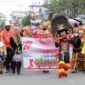 Pawai Budaya memeriahkan HUT RI ke 77 dan HUT Kabupaten Tanjab Barat ke 57 berlangsung semarak dan meriah, Kamis (18/8/22).  FOTO : Roy