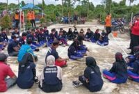 Pelajar SMK Negeri 7 Batara Saat Mengikuti Simulasi bencana terpusat di Kawasan Wisata Embung Desa Muntialo, Kecamatan Betara, Jum'at (12/11/21).