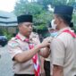 Kasiter Kasrem 042/Gapu Letkol Arm Budi Wahyono Pimpin Upacara HUT Pramuka Ke-61 Tahun 2022 Kwarda Jambi, Minggu (14/8/22). FOTO : PENREM