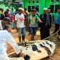 FOTO : Penyembelihan Hewan Qurban dilakukan usai shalat Ied di Sekretariat PWI Provinsi Jambi di kawasan Kotabaru, Kota Jambi, Jumat (31/07/20)