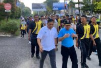 Personel Brimob Polda Jambi Ketika Ikut Serta Meriahkan Jalan Sehat Akbar Jambi Indenpedent. FOTO : Dhea