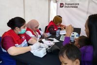 Pertamina Dirikan Posko Layanan Kesehatan Pasca Banjir di Depan Fuel Terminal Medan, Labuhan. FOTO : WKI