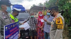Kapolres Muaro Jaambi AKBP AKBP Ardiyanto Memeriksa Kendaraan yang Mintas. FOTO : Indotimes.co