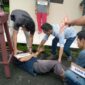 Satuan Teserse Rriminal Polres Muaro Jambi mengelar rekonstruksi atau rekan adegan kasus pembunuhan yang terjadi di Desa Jambi Tulo, Kecamatan Maro Sebo, di Mapolres Muaro Jambi, Kamis (17//3/22). FOTO : Noval