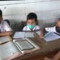 Siswa SDN 164 Kasang Kota Jambi saat Belajar Numpang di Gedung SDN 190 Kota Jambi. FOTO : Ist.