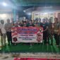 Tim gabungan Tni Polri mensosialisasikan himbauan pencegahan aksi kejahatan jalanan atau aktivitas geng motor di RT 17 Kelurahan The Hok, Kecamatan Jambi Selatan, Kota Jambi, Kamis malam (29/9/22). FOTO : Dhea