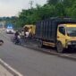 Unit Laka Satlantas Polres Muaro Jambi OLah TKP Kecelakaan Mitsubishi Truck BH 8377 XU dan Truck BH 8517 LF. FOTO : Hms