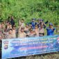 Kasubid Penmas Kompol Mas Edy Mengikuti Penanaman Pohon Mangrove di Pelindo bersama Polres Tanjab Timur pinggiran Sungai Muara Sabak, Jum'at, (13/10/23). FOTO : HUMAS