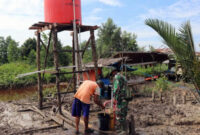 FOTO : Pompa Air Buatan Satgas TMMD ke 108 Kodim 0419/Tanjab Desa Labuhan Pering, Kecamatan Sadu, Kabupaten Tanjung Jabung Timur.