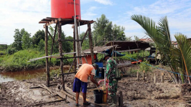 FOTO : Pompa Air Buatan Satgas TMMD ke 108 Kodim 0419/Tanjab Desa Labuhan Pering, Kecamatan Sadu, Kabupaten Tanjung Jabung Timur.