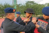 Komandan Satuan Brimob Polda Jambi Kombes Pol Nadi Chaidir Memimpin Upacara Penutupan Pembinaan Tradisi dan Pembaretan di Mako Brimob Polda Jambi, Jum'at (30/9/22). FOTO : Dhea