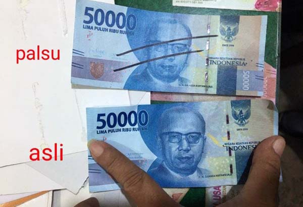 Uang Palsu yang Ditandai Coretan Oleh Penemau. FOTO : Ust.