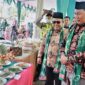 Wakil Bupati H. Hairan, SH bersama Kepala Perwakilan BKKBN Provinsi Jambi Dr. Munawar Ibrahim S.Kp M.Ph tinjau hasil olahan DASHAT. FOTO : Prokopim