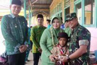 Kodim 0419 Gelar Program Dapur Masuk Sekolah di SDN 100/V Desa Sungai Gebar. FOTO : PENDIM