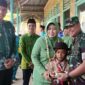 Kodim 0419 Gelar Program Dapur Masuk Sekolah di SDN 100/V Desa Sungai Gebar. FOTO : PENDIM