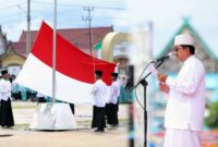 Bupati H. Anwar Sadat pimpin upacara Hari Santri Nasional Tahun 2022 di Alun - Alun Kota Kuala Tungkal, Sabtu (22/10/22). FOTO : Prokopim/Edt